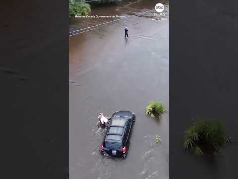 Driver rescued from Debby floodwaters in Florida