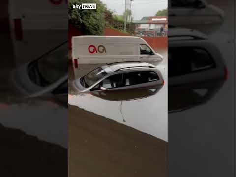 Cars trapped in floodwaters